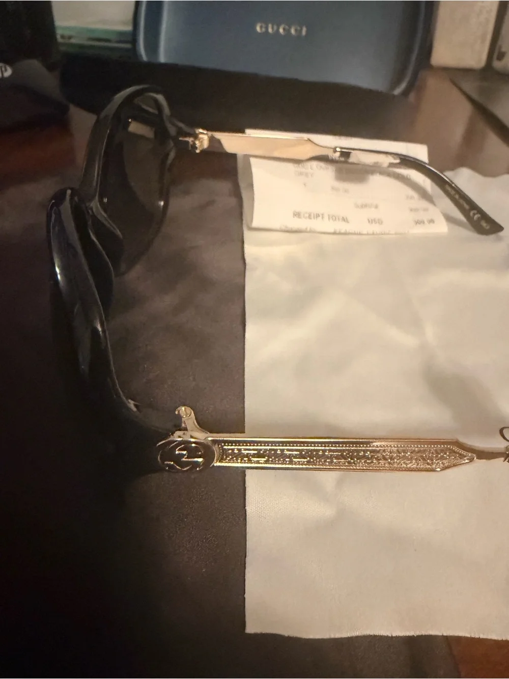 Gucci Women's Black Frame Sunglasses with Dark Gradient Lenses
